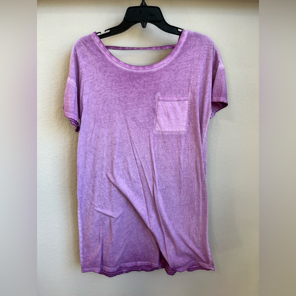 Over sized pink shirt. Open back.